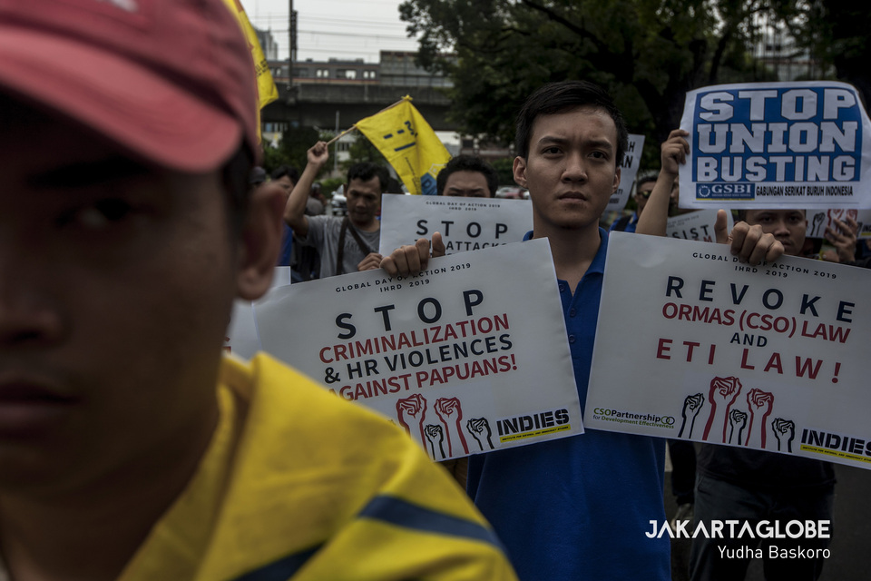Activists protest human rights violations against indigenous Papuans on International Human Rights Day outside the US Embassy in Jakarta on Dec. 10, 2019. (JG Photo/Yudha Baskoro)