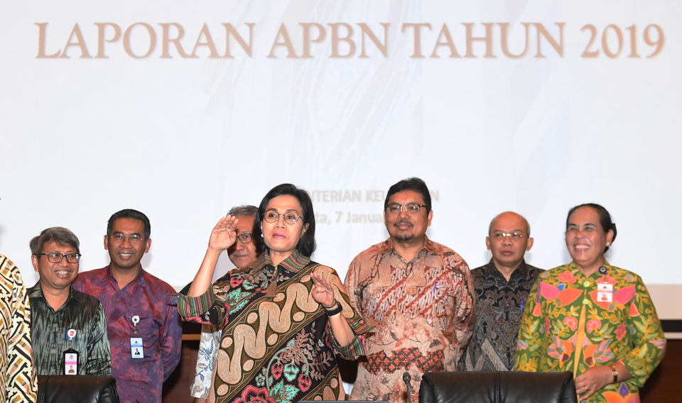 Finance Minister Sri Mulyani Indrawati, center, delivers a press conference on the 2019 state budget in Jakarta on Tuesday. (Antara Photo/Akbar Nugroho Gumay)