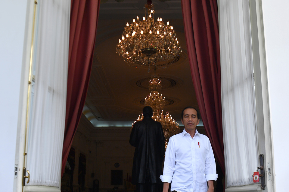 President Joko 'Jokowi' Widodo prepares for a speech at Merdeka Palace in Jakarta on Tuesday. (Antara Photo/Sigid Kurniawan)

