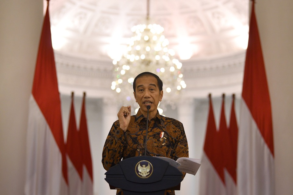 President Joko 'Jokowi' Widodo addresses the nation about the Covid-19 pandemic from Bogor Palace in West Java on Sunday. 
(Antara Photo/Sigid Kurniawan)