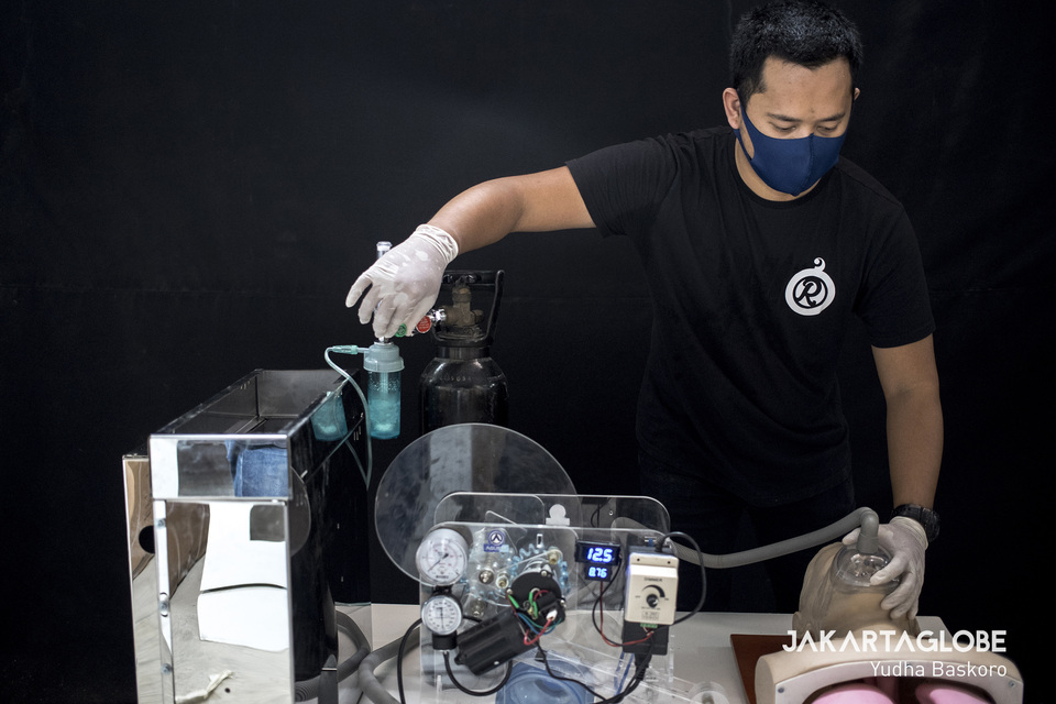 Indonesian entrepreneur Anton Agusta, who owns a tumble dryer factory, develops a ventilator prototype at his workshop in Kebayoran Lama, South Jakarta. (JG Photo/Yudha Baskoro)