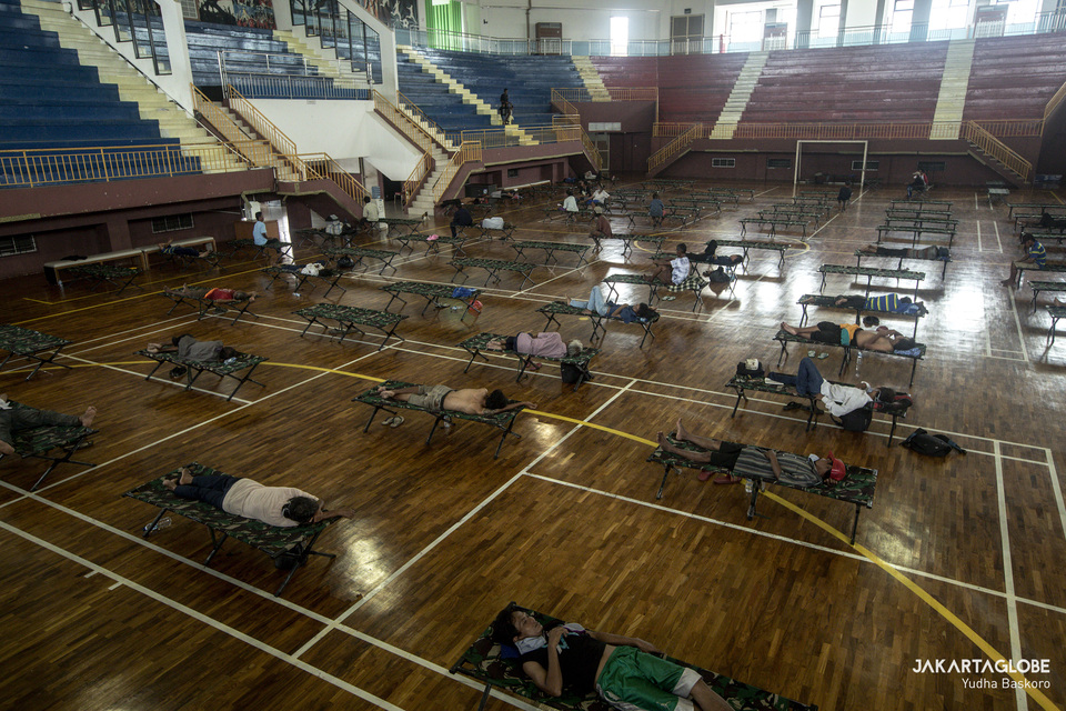 Inside Jakarta's Ciracas Sports Hall, which has been turned into a shelter for homeless people, on May 1. (JG Photo/Yudha Baskoro)