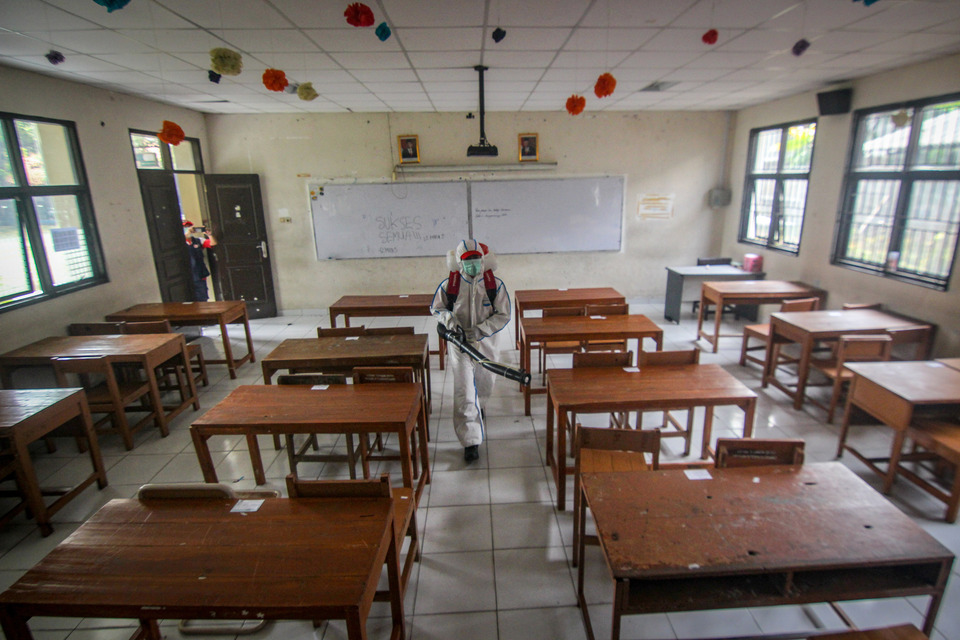 An Indonesian Red Cross (PMI) officer disinfects a classroom in a school in Tangerang, Banten, last week. (Antara Photo/Fauzan)
