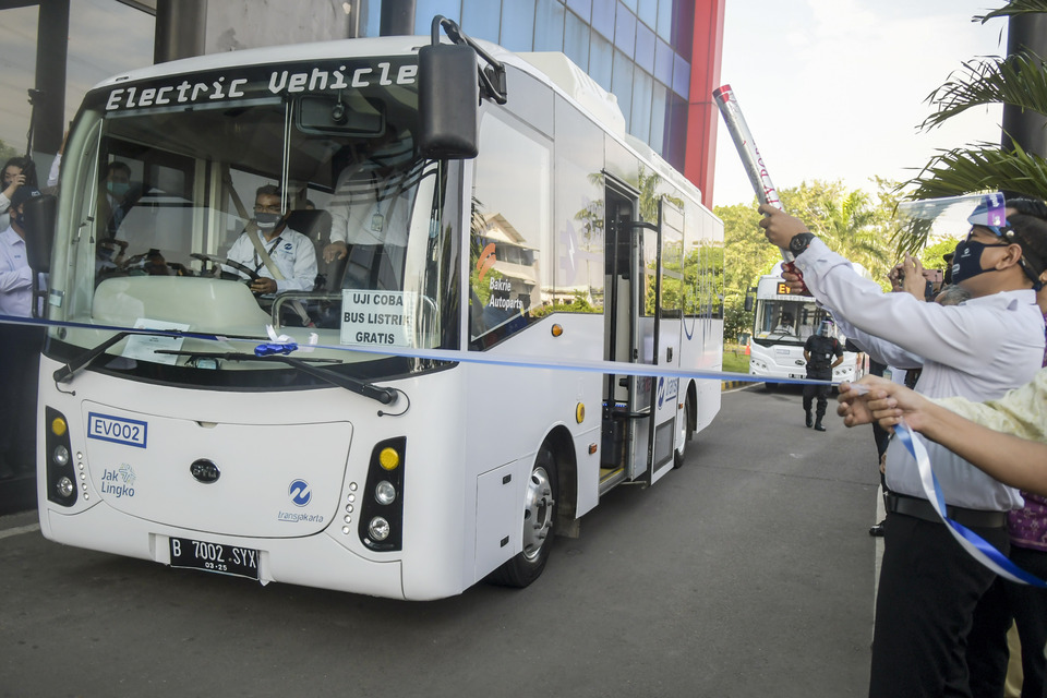 An electric bus begins road test from Transjakarta headquarters in Cawang, East Jakarta, on July 6, 2020. (Antara Photo/Galih Pradipta)