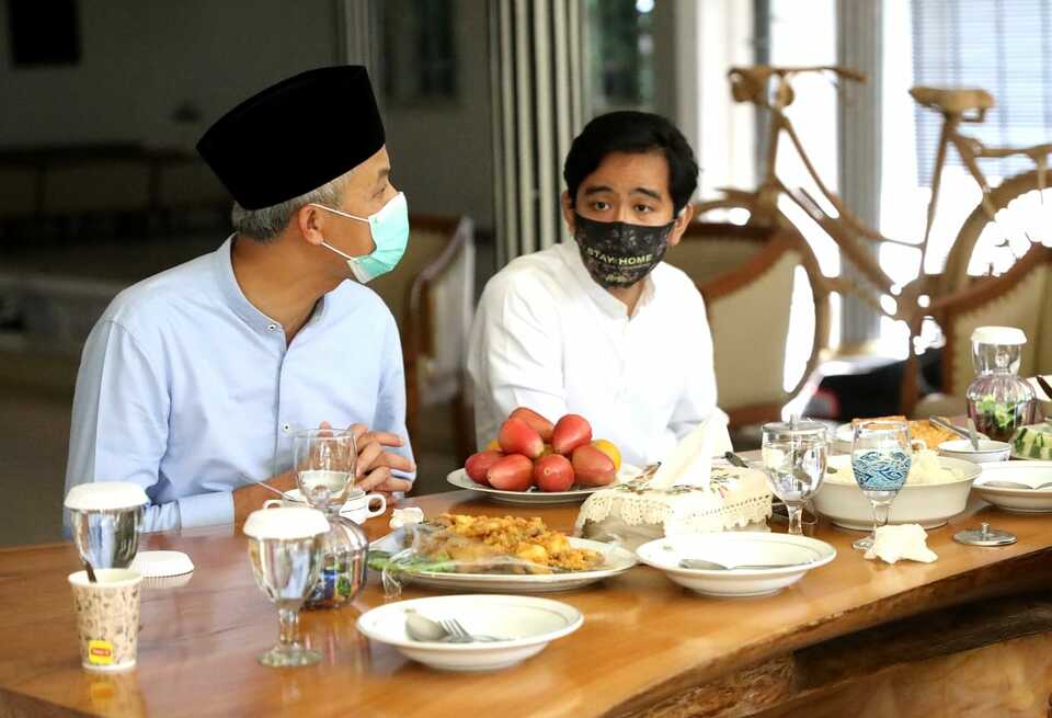 Gibran Rakabuming Raka, right, meets with Central Java Governor Ganjar Pranowo in the latter's residence in Semarang on July 17, 2020. (B1 Photo/Stefi Thenu)