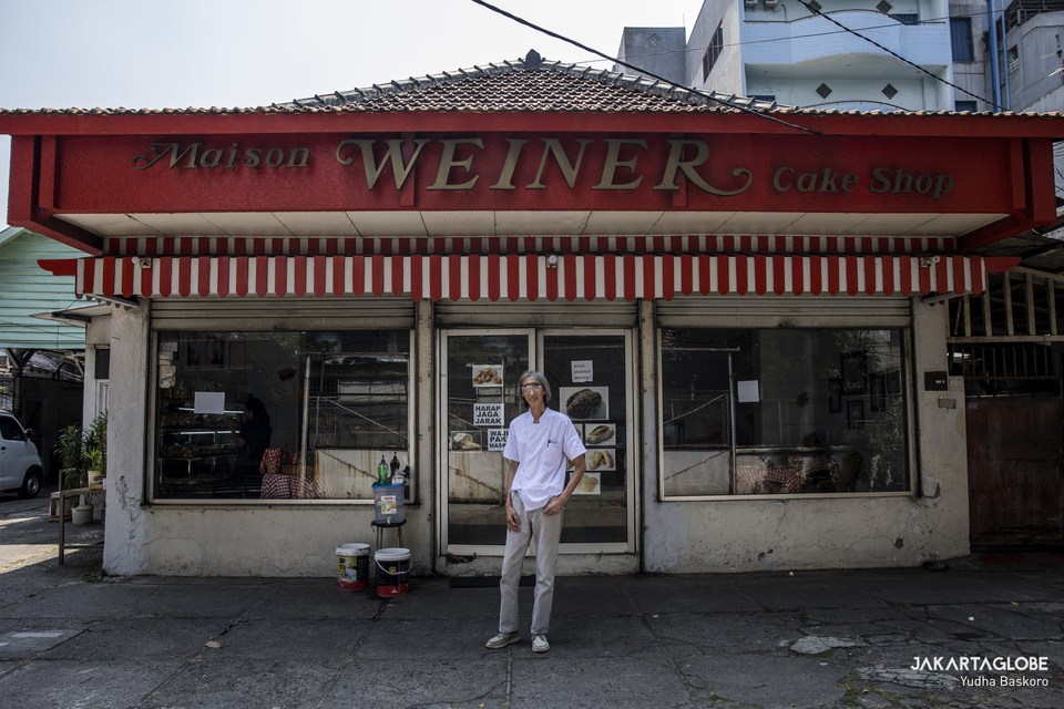 Heru Laksana, 65, stands in front of his Maison Weiner Cake Shop in Senen, Central Jakarta on Friday. (JG Photo/Yudha Baskoro)