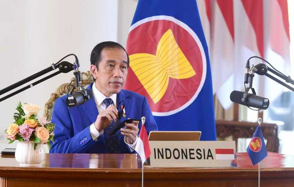 President Joko "Jokowi Widodo attends a meeting in the 37th Asean Summit virtually from Bogor Palace in West Java on Sunday. (Photo courtesy of the State Secretariat)