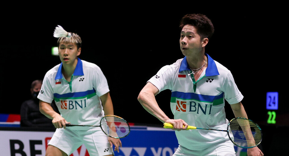 Marcus Fernaldi Gideon, left, and Kevin Sanjaya Sukamuljo in their first round match in Birmingham before they were asked to self-isolate on March 18, 2021. (Photo Courtesy of BWF)