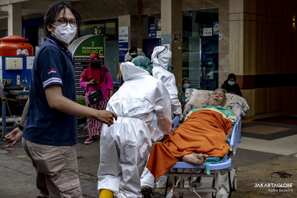 A Covid-19 patient is taken to the Bekasi Municipal Hospital in West Java on June 24, 2021. (JG Photo/Yudha Baskoro)