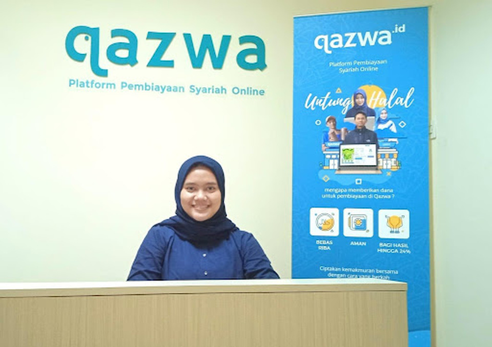 An office receptionist at Qazwa, an online shariah financing platform. (Photo Courtesy of Qazwa)
