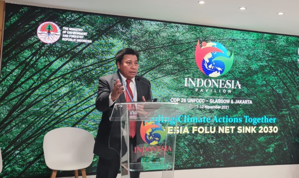 Sihol Aritonang, President Director of Riau Andalan Pulp and Paper (RAPP) speaks during a discussion at the Indonesia Pavilion at Cop26 in Glasgow, Scotland, on November 4, 2021. (Photo Courtesy of APRIL Group)