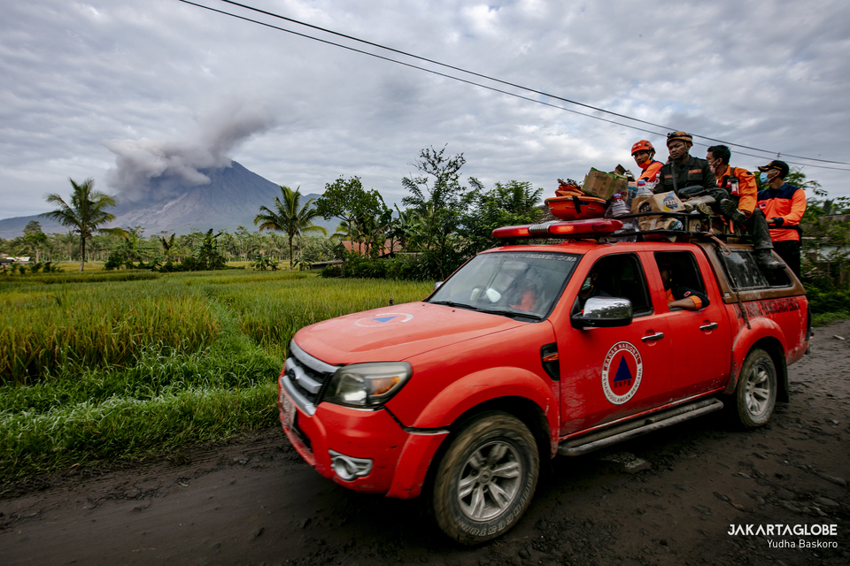 FILE - National Disaster Mitigation Agency (BNPB) personnel patrol Curah Kobo'an Village in the East Java district of Lumajang on December 7, 2021 in the aftermath of Mt Semeru eruption. (JG Photo/Yudha Baskoro)