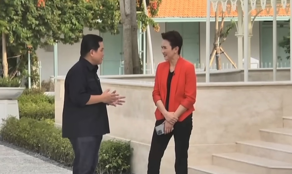 State-Owned Enterprise Minister Erick Thohir, left, talks with BTV news anchor Fristian Griec in Solo, Central Java, on December 8, 2022. (Videography)  