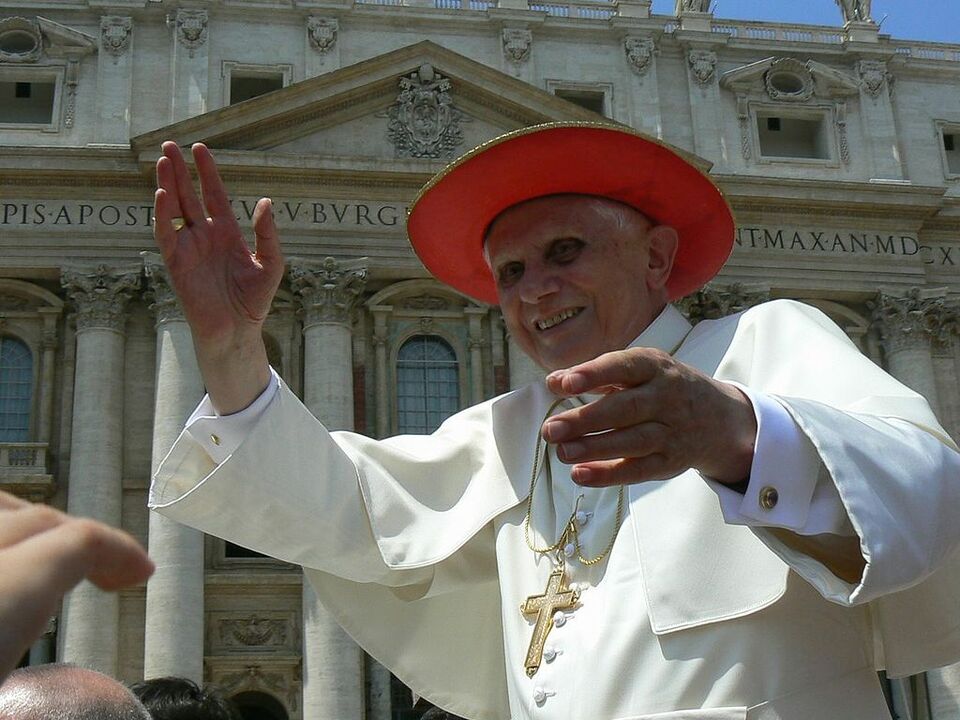 This 2007 file photo shows Pope Benedict XVI wearing the red papal cappello romano during an open-air Mass in Rome. (Photo courtesy of Madeleine Schäfer)