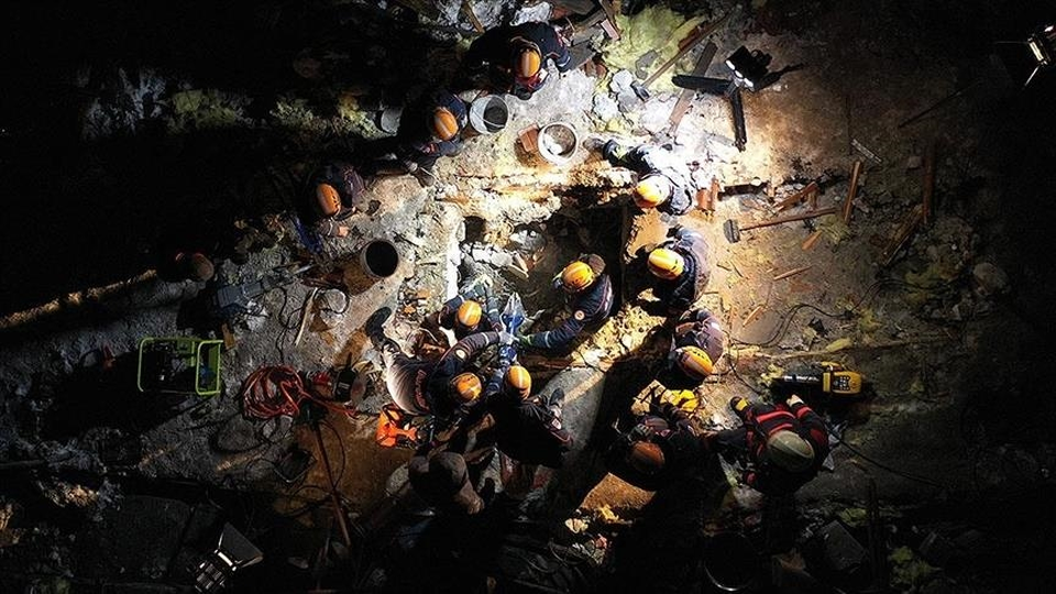 Rescue workers search for survivors after powerful earthquakes jolted Turkiye on February 6, 2023. (Anadolu Agency)