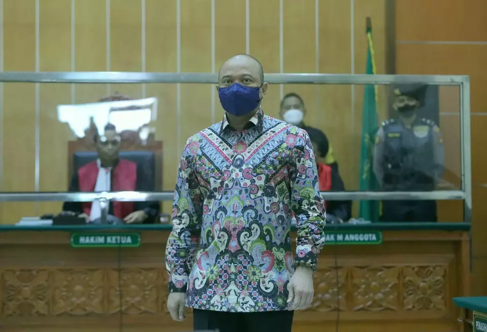 Insp. Gen. Teddy Minahasa arrives at the West Jakarta District Court for a hearing in his drug trafficking trial on March 30, 2023. (Joanito De Saojoao)