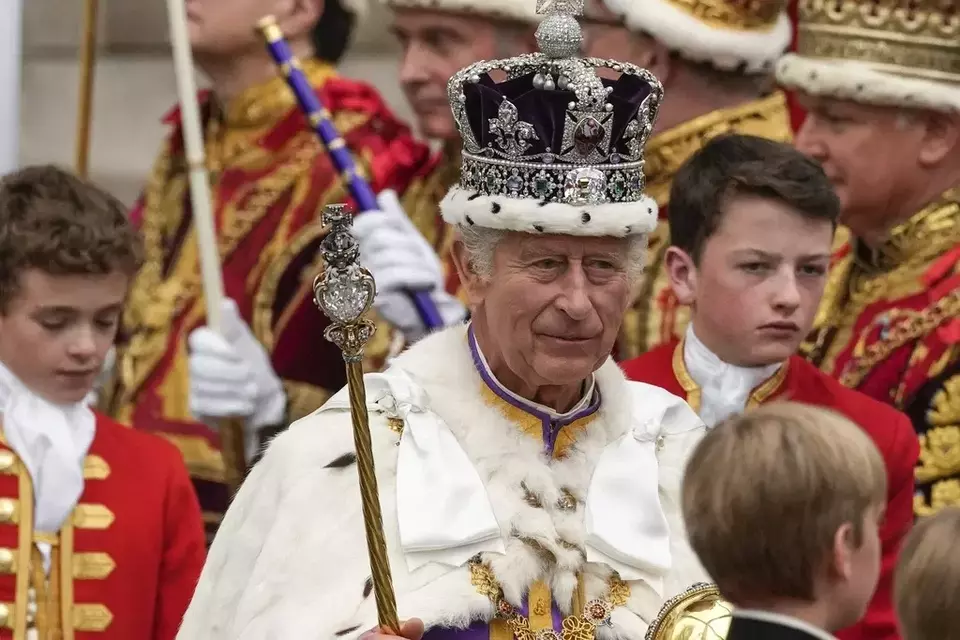 Britain s King Charles III departs Westminster Abbey after his coronation ceremony in London Saturday, May 6, 2023. (AP Photo/Alessandra Tarantino)