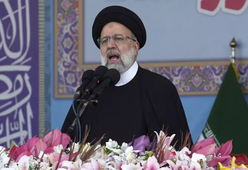 FILE - Iranian President Ebrahim Raisi speaks during the Army Day parade in front of the mausoleum of the late revolutionary founder Ayatollah Khomeini just outside Tehran, Iran, on April 18, 2023. (AP Photo/Vahid Salemi, File)
