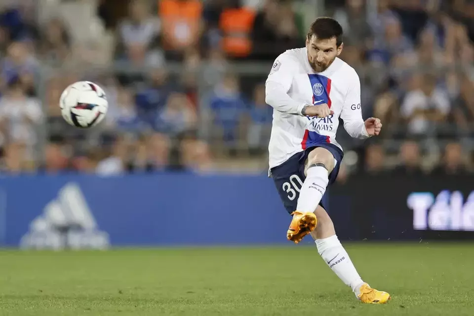 PSG player Lionel Messi kicks the ball during the French League One soccer match between Strasbourg and Paris Saint Germain at Stade de la Meinau stadium in Strasbourg, eastern France, Saturday, May 27, 2023. (AP Photo/Jean-Francois Badias)