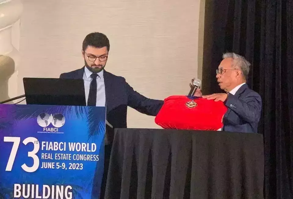 Ciputra Group Managing Director  Budiarsa Sastrawinata, right, is installed as the new president of the International Real Estate Federation (FIABCI) during an event in Miami, the United States, Friday, June 9, 2023. (Handout Photo)