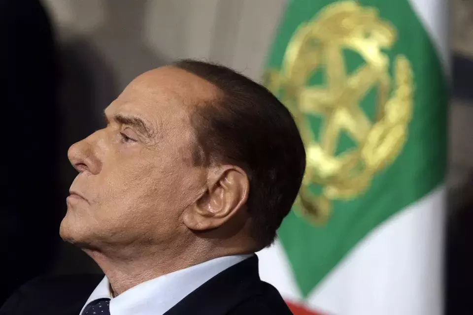 FILE - Silvio Berlusconi meets journalists at the Quirinale presidential palace after talks with Italian President Sergio Mattarella, in Rome, April 12, 2018. (AP Photo/Gregorio Borgia, File)