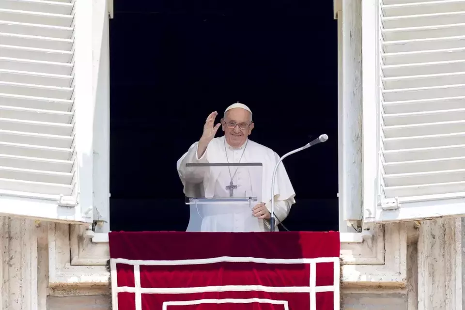 Pope Francis delivers his blessing as he recites the Angelus noon prayer from the window of his studio overlooking St.Peter s Square, at the Vatican, Sunday, June 18, 2023. (AP Photo/Andrew Medichini)