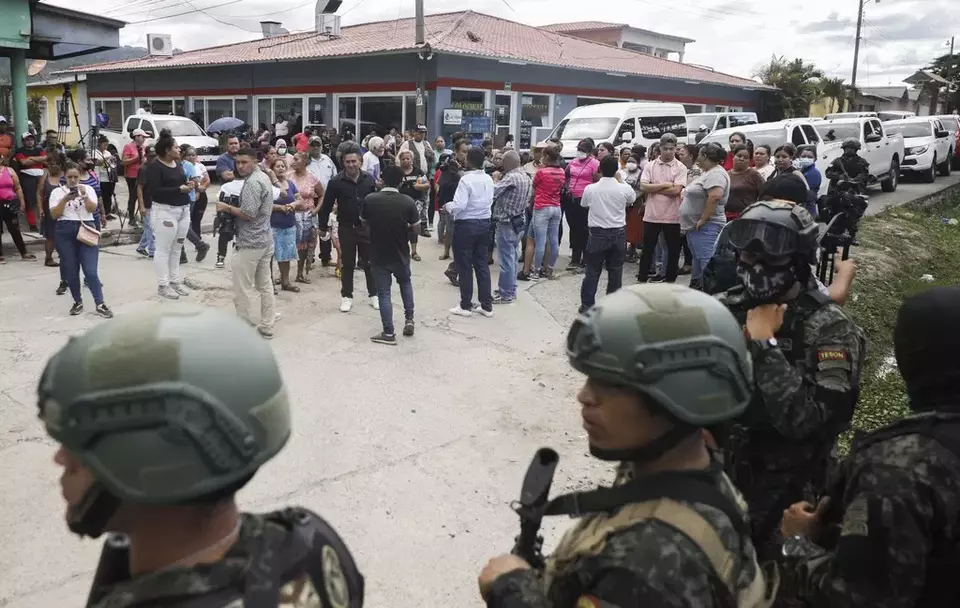 Police guard the entrance to the women s prison in Tamara, on the outskirts of Tegucigalpa, Honduras, Tuesday, June 20, 2023. A riot at the women