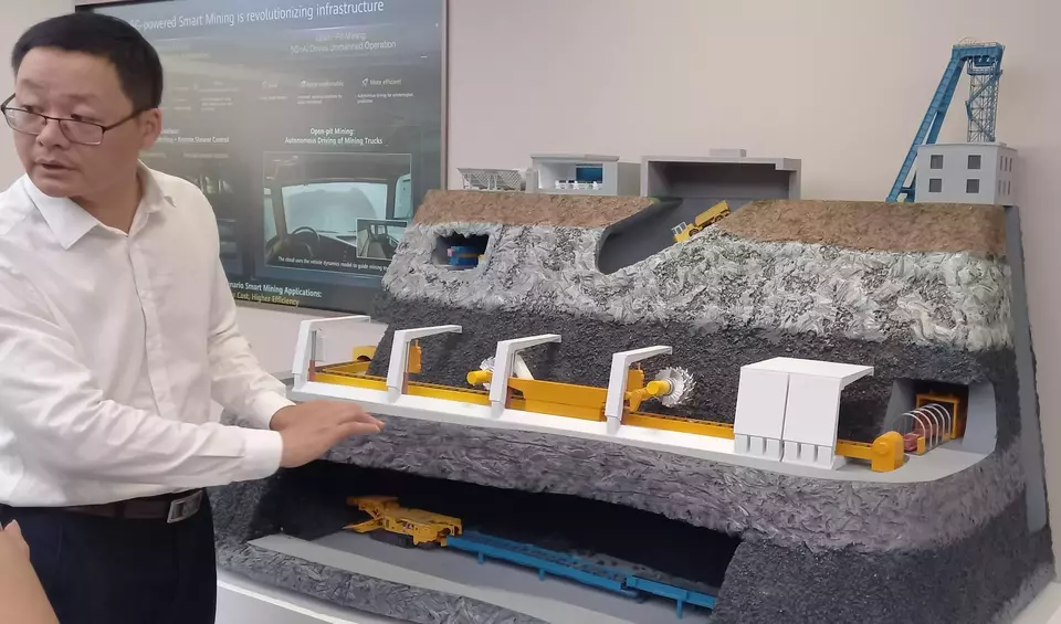 A Huawei employee explains how intelligent mining works at the Huawei research center in Shanghai, China, on June 29, 2023. (Heru Andriyanto)