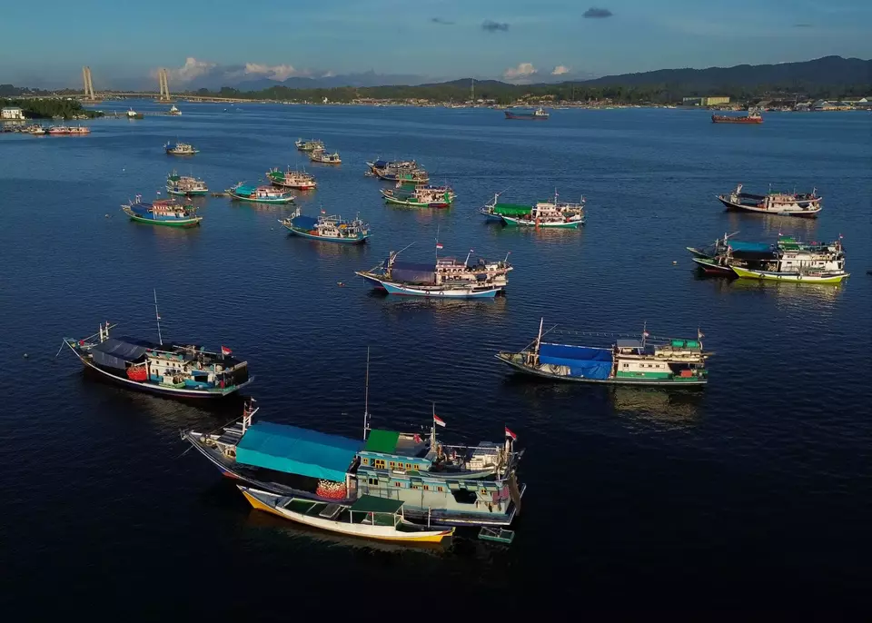 An aerial photo shows fishing boats at the Kendari Bay on June 26, 2023. (Antara Photo/Jojon)