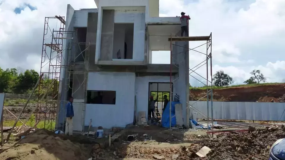 Workers build a home at Grandcity Balikpapan residential project in Balikpapan, East Kalimantan, Thursday, July 6, 2023. (Fuad Iqbal Abdullah)