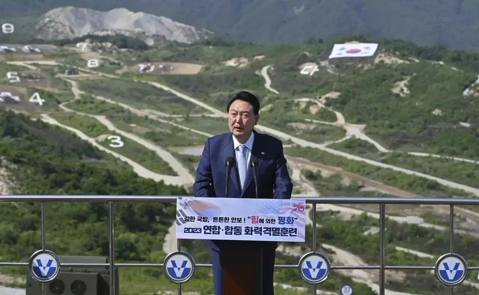 FILE - South Korean President Yoon Suk Yeol delivers a speech after a South Korea-U.S. joint military drill at Seungjin Fire Training Field in Pocheon, South Korea, June 15, 2023. President Yoon is to attend an annual NATO summit in Vilnius, Lithuania from July 11-12 as part of his two-nation trip that includes a stop in Poland. (Jung Yeon-je/Pool Photo via AP, File)