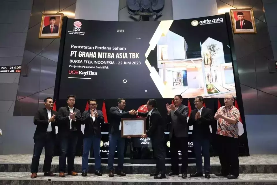 Executives of property developer Graha Mitra Asia attend a ceremony at the Indonesia Stock Exchange building in Jakarta marking its debut in the bourse on June 22, 2023. (Handout photo)