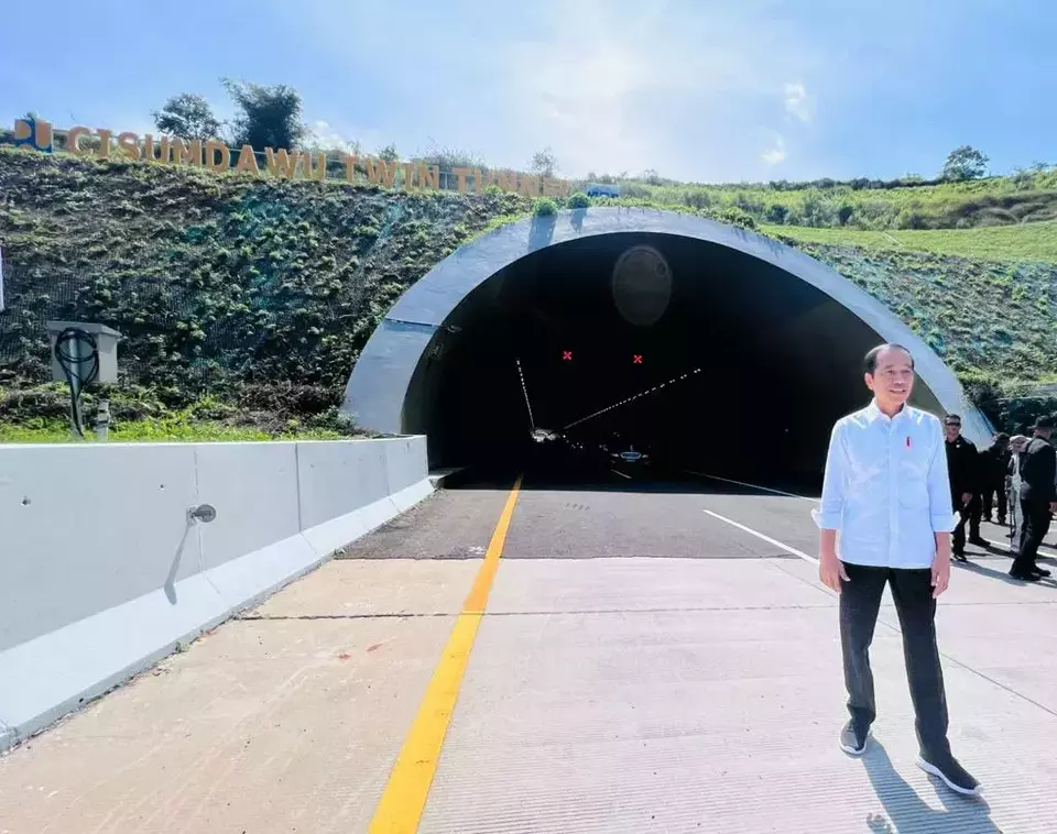 President Joko Widodo poses for a photo in front of a tunnel on the Cisumdawu Toll Road in Sumedang, West Java, Tuesday, July 11, 2023. (Presidential Press Bureau)