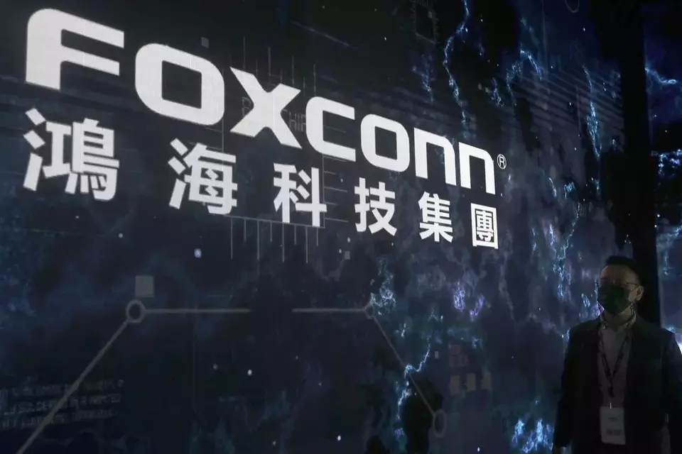 FILE - The Foxconn logo is seen during the Hon Hai Tech Day at the Nangang Exhibition Center in Taipei, Taiwan, on Oct. 18, 2022. (AP Photo/Chiang Ying-ying, File)