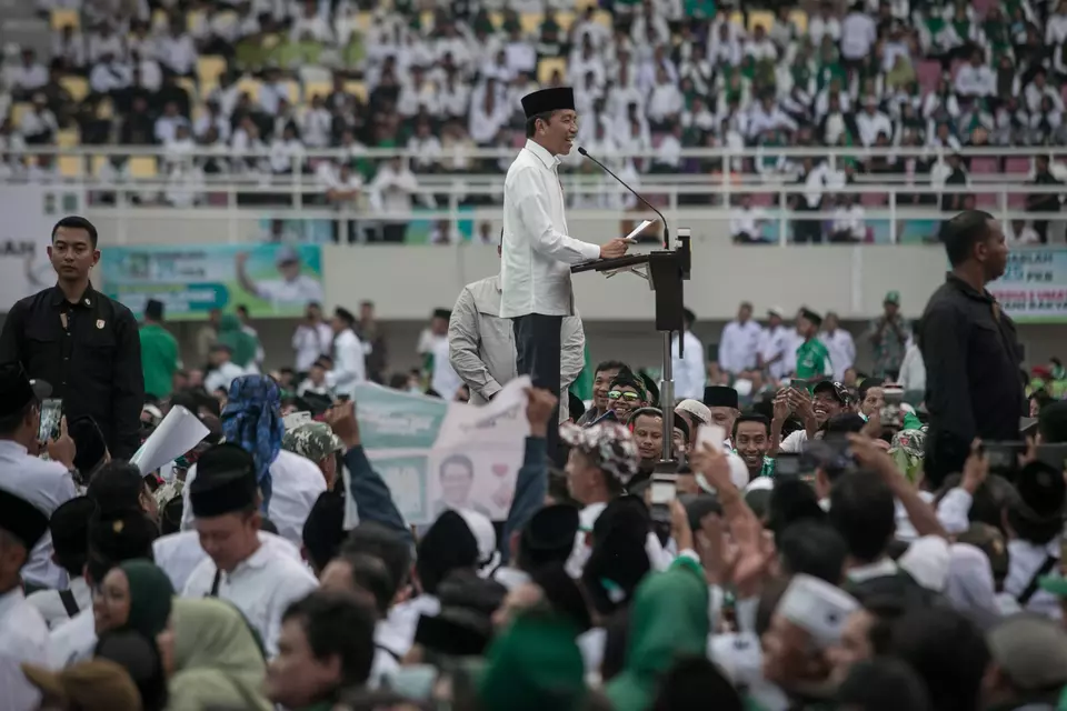 President Joko Widodo delivers a speech during an event to mark the 25th anniversary of the National Awakening Party (PKB) at Manahan Football Stadium in Solo, Central Java, Sunday, July 23, 2023. (Antara photo/Mohammad Ayudha)