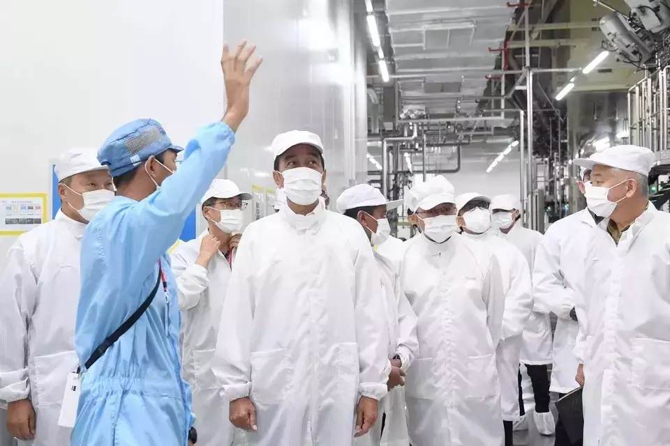 President Joko Widodo visits an electric vehicle battery factory run by joint venture company Hyundai LG Industry Green Power in Karawang, West Java province, Thursday, Sept. 14, 2023. (Handout)