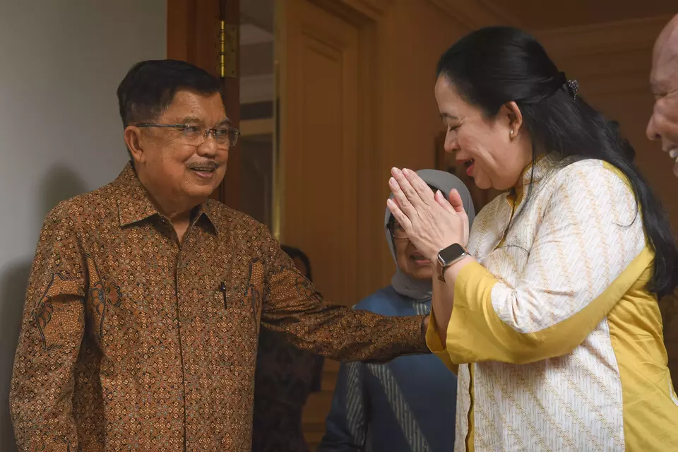 Former Vice President Jusuf Kalla, left, receives a visit by Indonesian Democratic Party of Struggle (PDI-P) Executive Puan Maharani at his private residence in Kebayoran Baru, South Jakarta, Wednesday, Oct. 4, 2023. (Antara Photo/Aditya Pradana)