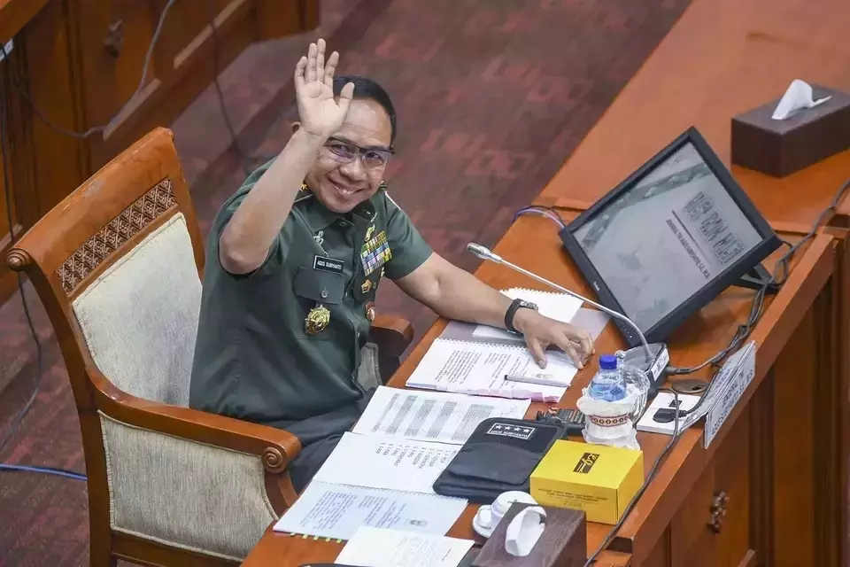 General Agus Subiyanto, the nominee for the Indonesian Armed Forces Commander, waves at journalists before a hearing with lawmakers for his confirmation at the parliament building in Jakarta, Monday, Nov. 13, 2023. (Antara Photo/Galih Pradipta)