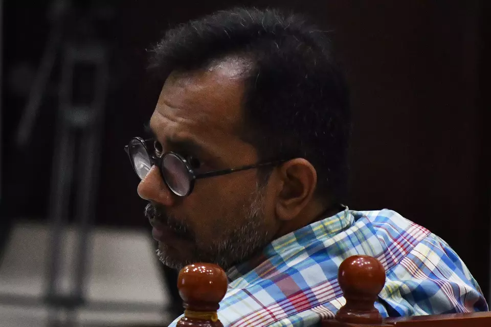 Rights activist Haris Azhar attends a court hearing in his defamation trial initiated by Chief Security Minister Luhut Binsar Pandjaitan, at the East Jakarta District Court, Monday, Nov. 13, 2023. (Antara Photo/Fakhri Hermansyah)