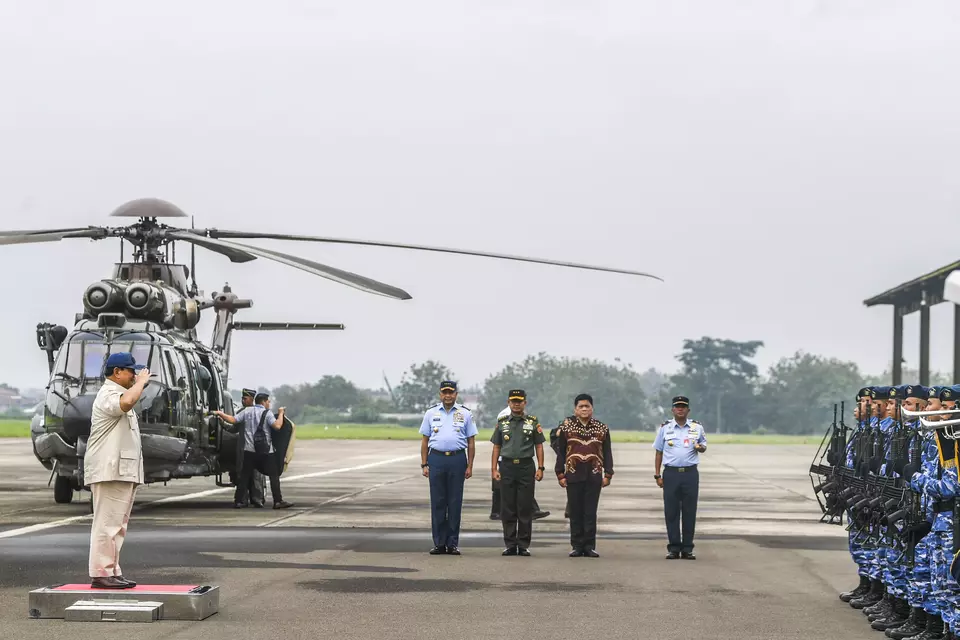 Defense Minister Prabowo Subianto symbolically hands eight Airbus H225M transport helicopters to the Air Force during a ceremony at Atang Sendjaja Air Force Base in Bogor, Friday, Dec. 1, 2023. (Antara Photo/Galih Pradipta)