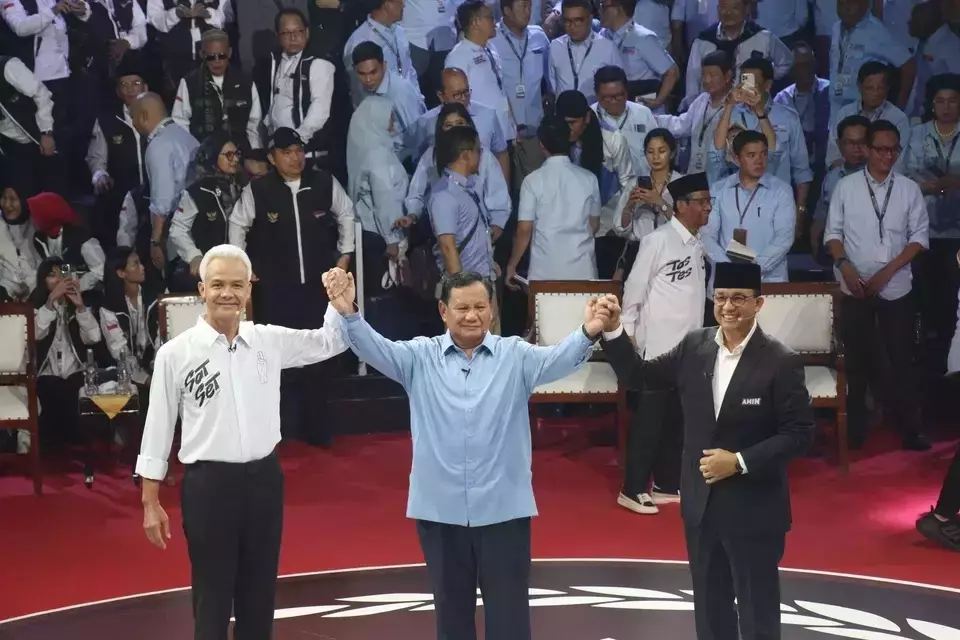 From left: Presidential candidates Ganjar Pranowo, Prabowo Subianto, and Anies Baswedan pose for a photo after the presidential debate at the General Election Commission (KPU) building in Jakarta, Tuesday, Dec. 12, 2023. (B-Universe Photo/Joanito De Saojoao)