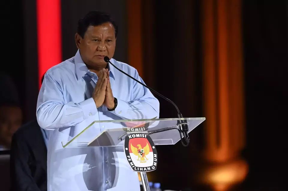 Presidential candidate Prabowo Subianto greets the audience during the presidential debate at the Istora Sports Stadium in Jakarta, Sunday, Jan. 7, 2024. (Antara Photo/Aditya Pradana Putra)