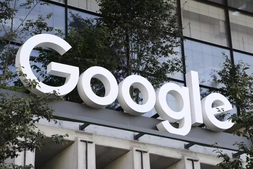 FILE - The Google sign is shown over an entrance to the company
