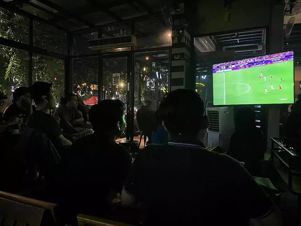 Football fans watching a game between Indonesia vs Iraq at a cafe in South Jakarta on Monday, Jan. 16, 2024.