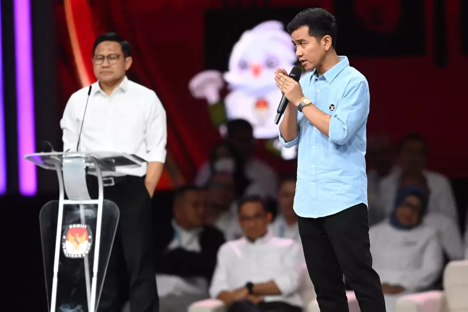 Vice-presidential candidate Gibran Rakabuming Raka, right, speaks during a debate as rival Muhaimin Iskandar looks on at the Jakarta Convention Center, Sunday, Jan. 21, 2024. (Antara Photo//M Risyal Hidayat)