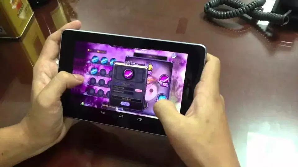 A photo illustration of mobile gaming. (B1 File Photo)