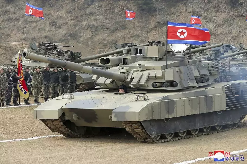 In this photo provided by the North Korean government, North Korean leader Kim Jong Un drives a new-type tank in North Korea, Wednesday, March 13, 2024. Independent journalists were not given access to cover the event depicted in this image distributed by the North Korean government. The content of this image is as provided and cannot be independently verified. (Korean Central News Agency/Korea News Service via AP)