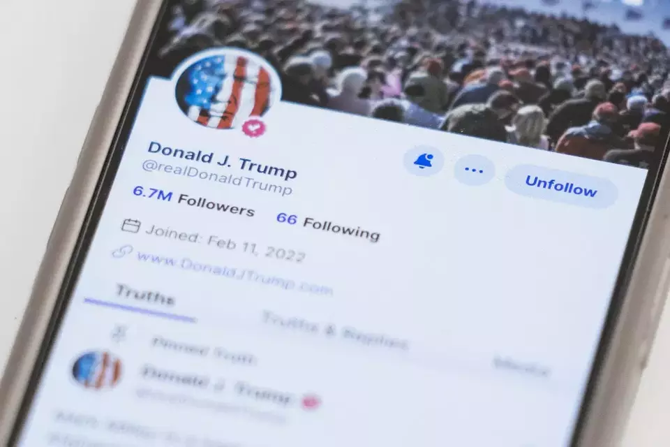 The Truth Social account for former President Donald Trump is seen on a mobile device, Wednesday, March 20, 2024, in New York. (AP Photo/John Minchillo)