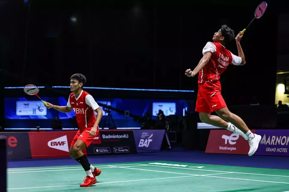 Indonesian shuttlers play a match in the 2022 Thomas Cup finals in Thailand. (Photo courtesy of Badminton World Federation)