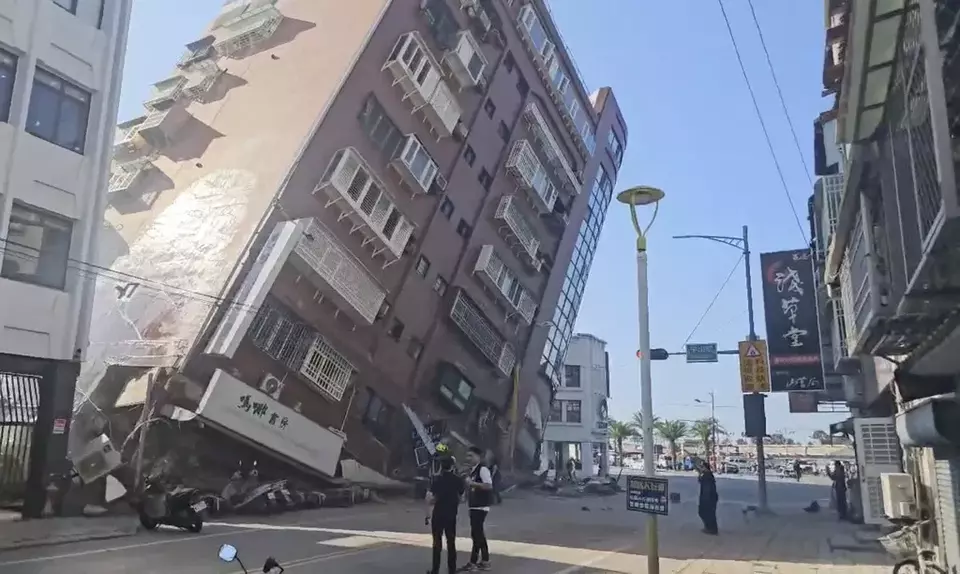 In this image taken from a video footage run by TVBS, a partially collapsed building is seen in Hualien, eastern Taiwan on Wednesday, April 3, 2024. (TVBS via AP)